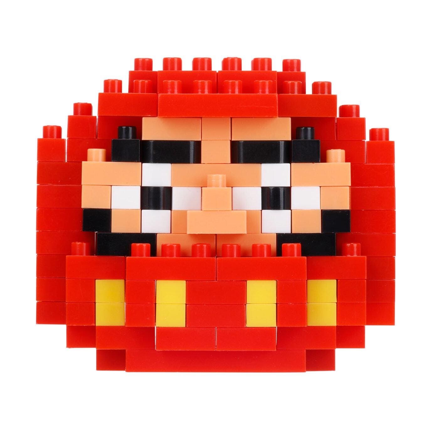 A red and yellow pixelated character composed of numerous small red and yellow blocks, creating a playful and colorful design.