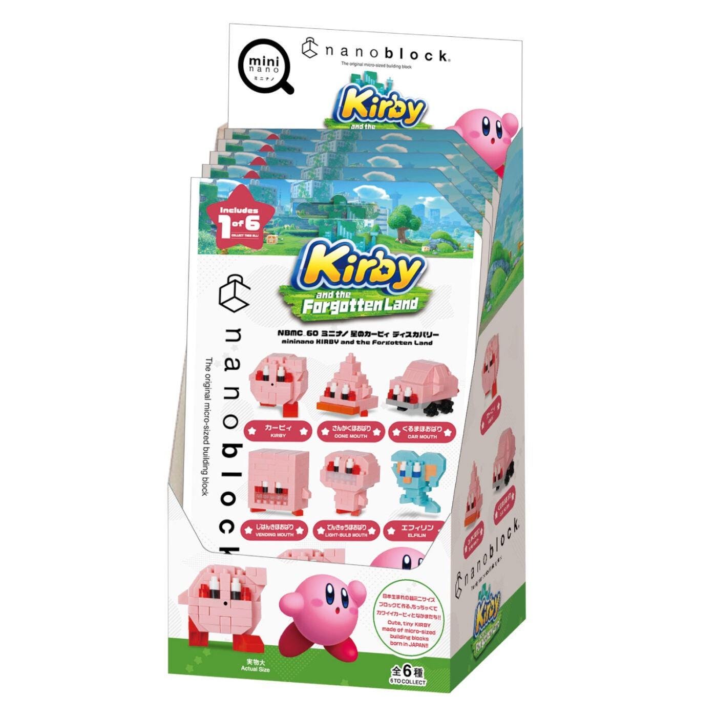 A display of various pink and blue figurines, likely representing characters from the Nintendo series, arranged in a box.