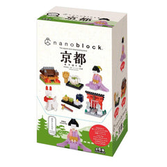 The image is a box containing a set of miniature figurines, including a woman, a cat, and a bird, as well as other small objects.