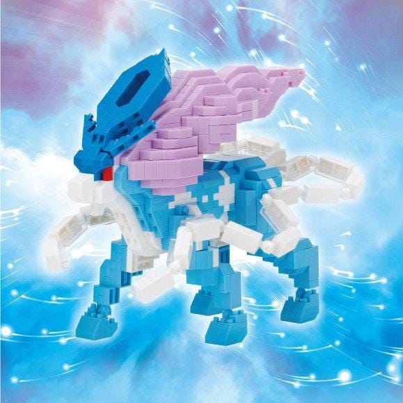 A colorful, pixelated robot-like figure made of blue and white blocks, with a large head and a pink body, set against a blue and purple background with wispy clouds.