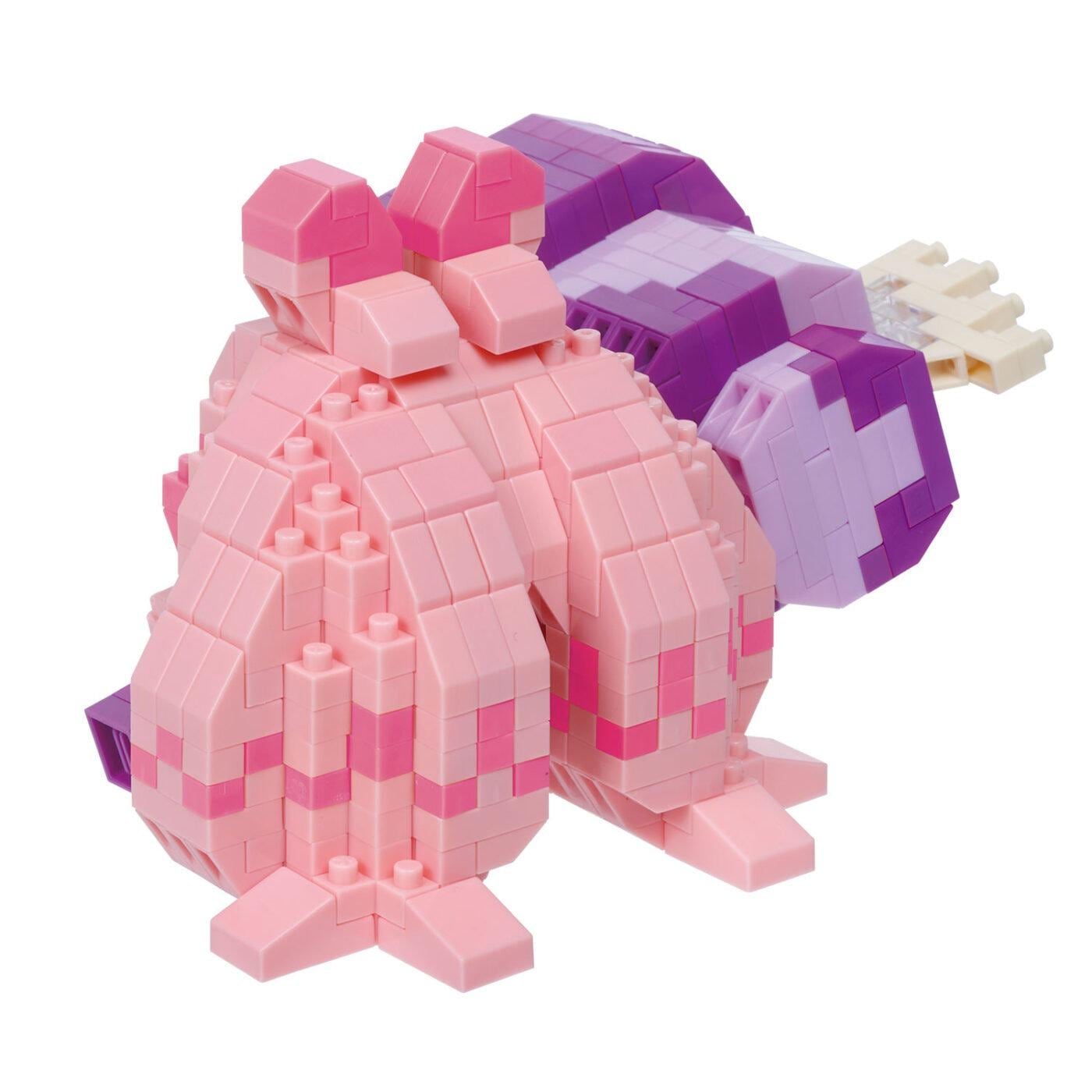 A pink and purple Lego structure made up of various blocks in different shapes and sizes.