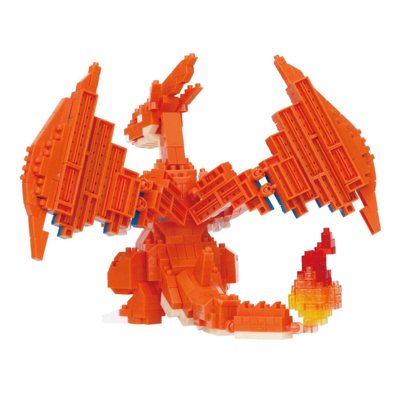 A large orange LEGO dragon figurine with wings and a flame on its tail.