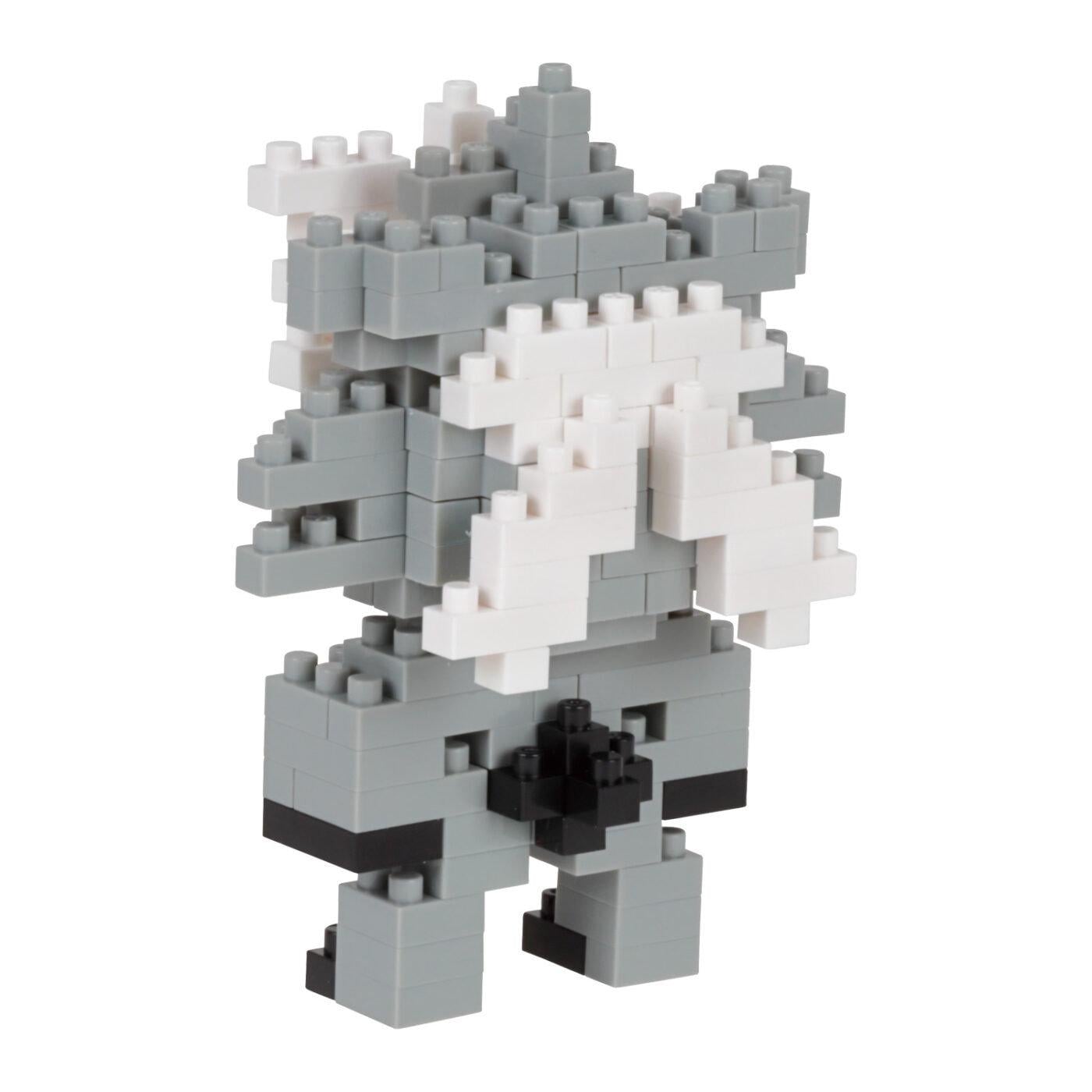 A gray and white LEGO brick figure composed of various gray and white LEGO bricks.