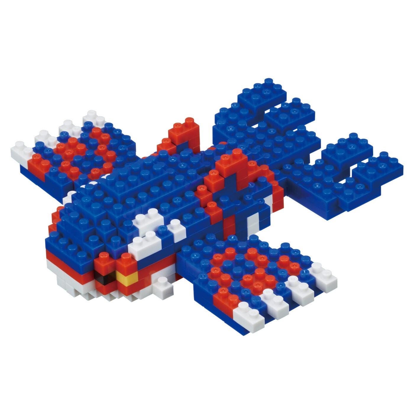 A colorful toy made of small building blocks in red, white, and blue colors.