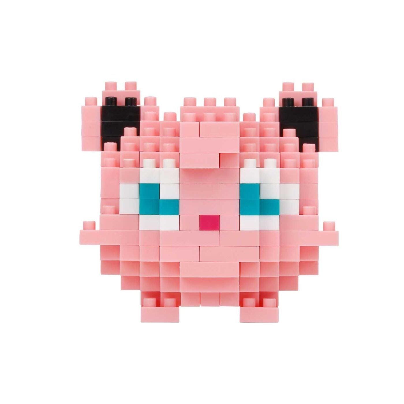 A pink pixelated character with blue eyes and black ears, composed of small pink and black blocks.