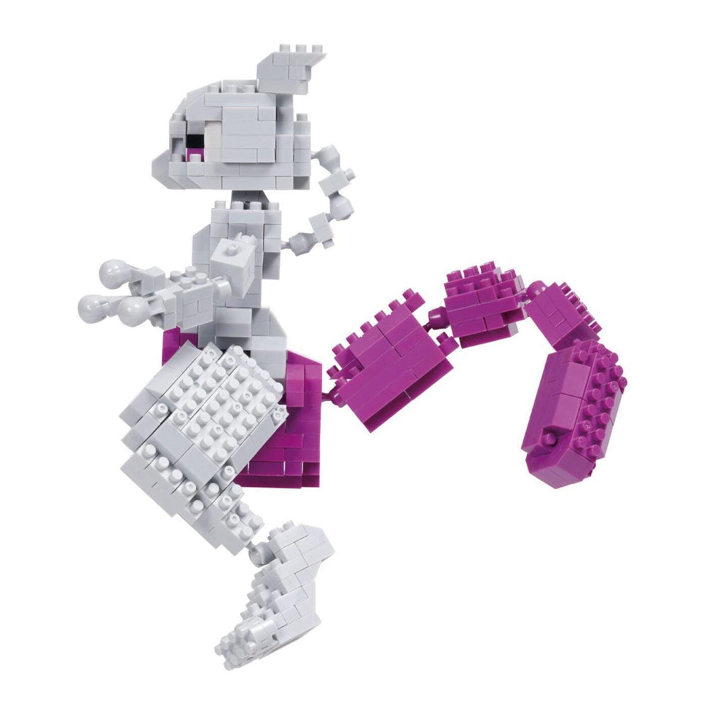 A toy figure made of small, colorful building blocks in shades of gray and purple.