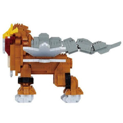 A Lego robot made of various colored bricks, including orange, gray, and white, with a yellow head and red accents.