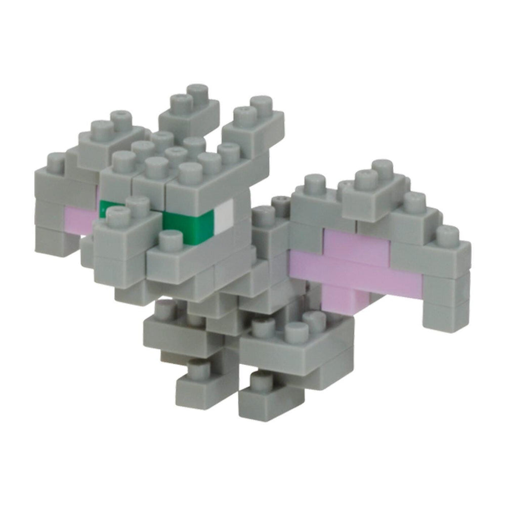 A gray LEGO brick figure with green eyes and pink wings.