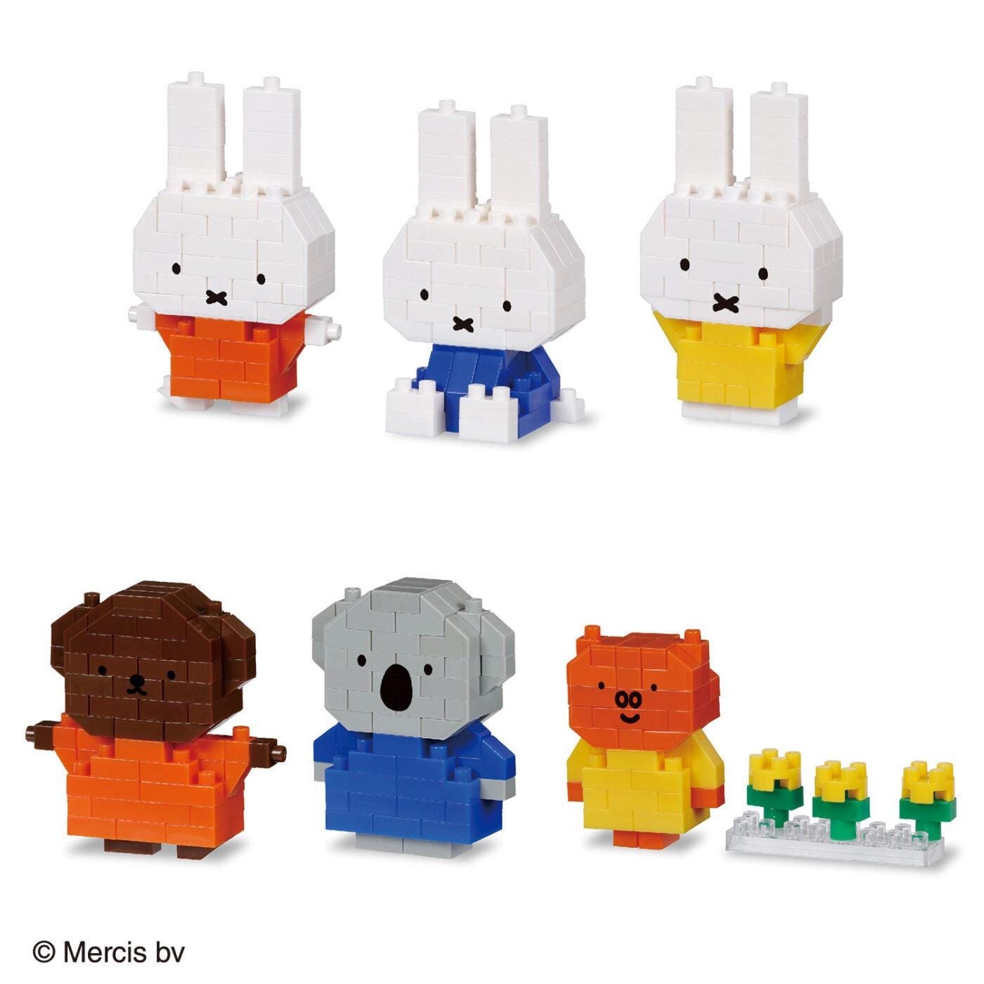 a collection of five different animal-themed building block figures, including a rabbit, a koala, a bear, a dog, and a cat.