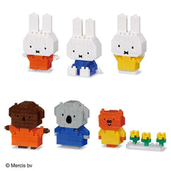 a collection of five different animal-themed building block figures, including a rabbit, a koala, a bear, a dog, and a cat.