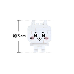 A white, cartoon-like character with a face and eyes drawn on it, along with measurements indicating it is 3 cm in height.