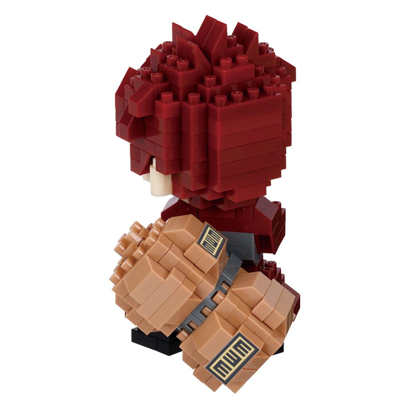 A toy figurine made of small red and brown building blocks, resembling a character or character design.