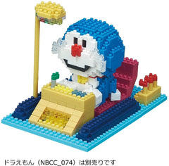 A colorful and detailed model of a Doraemon character made of small building blocks, including a yellow pole and various other elements.