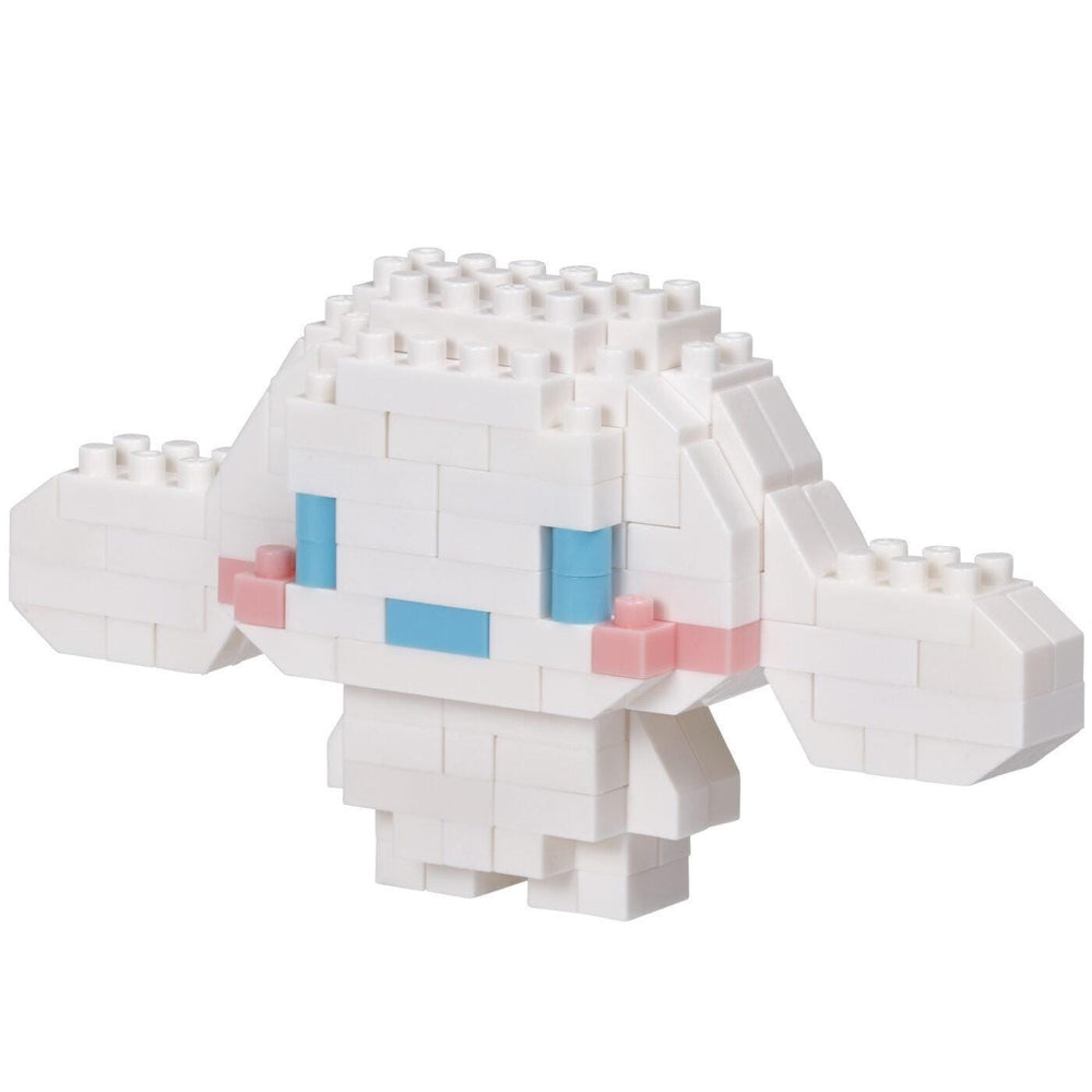 A white, pixelated character made of small white blocks, resembling a pixelated doll or a pixelated animal.