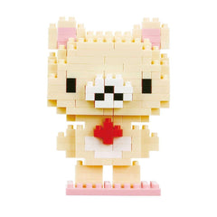A pixelated image of a cute, beige-colored bear with a red heart-shaped button on its chest.