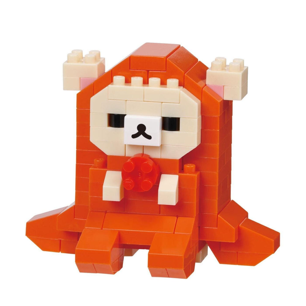 An orange and white toy resembling a small animal, possibly a bear or a rabbit, made up of numerous small blocks.
