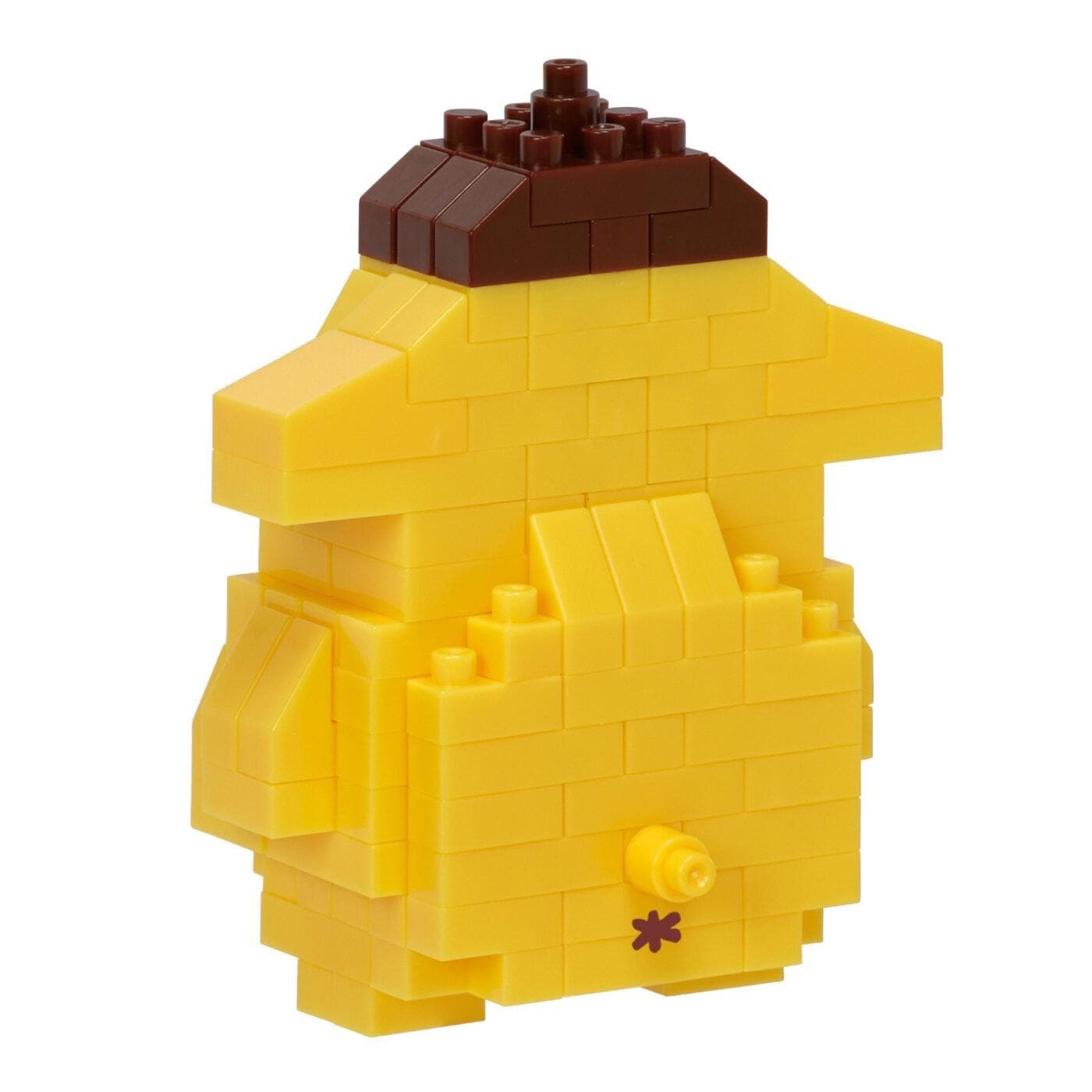 A yellow and brown block toy resembling a small animal or character, with a brown top and yellow body.