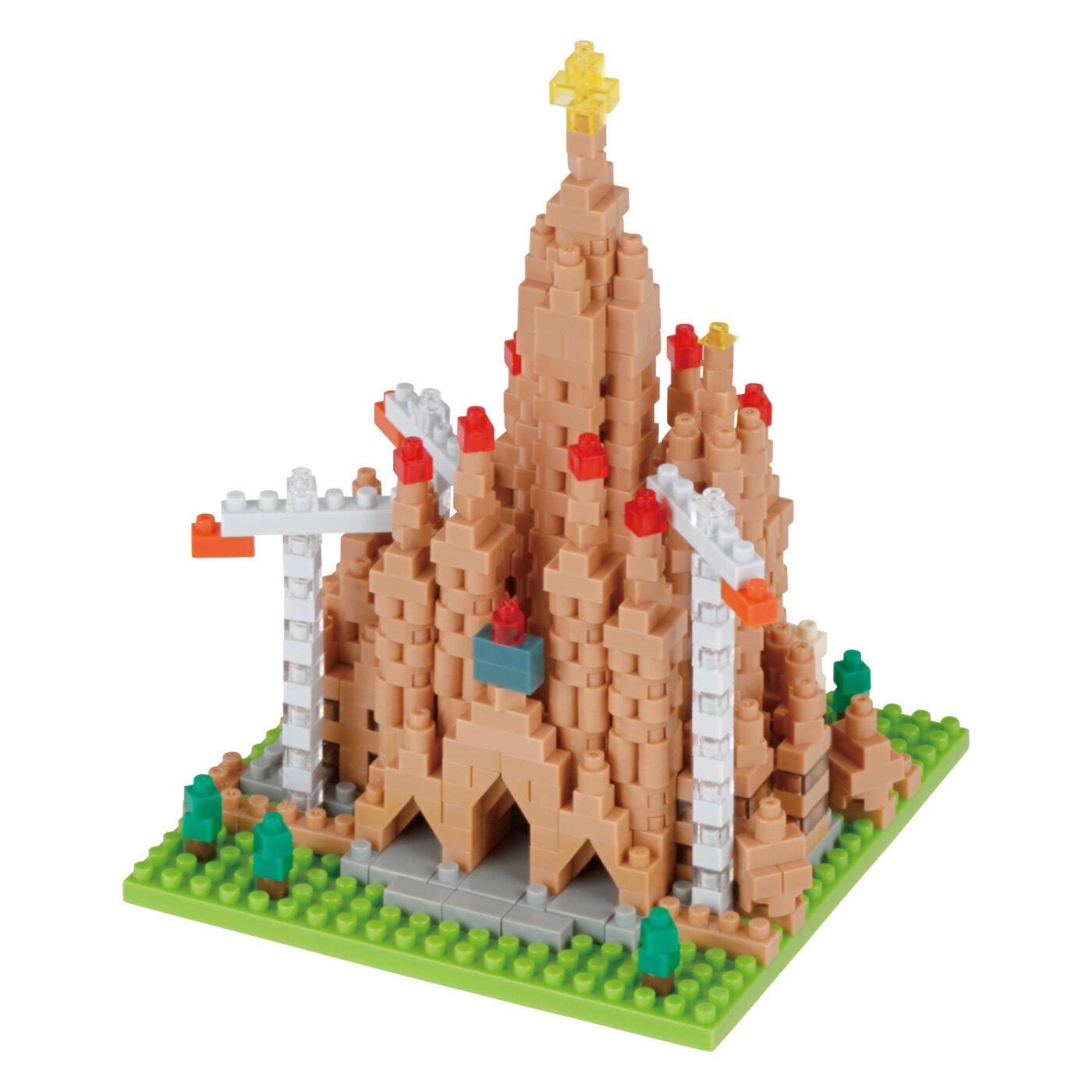 A colorful and intricate model of a castle made out of small building blocks, with various towers and turrets.