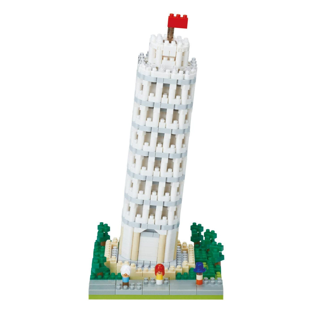 A white Lego tower with a red flag on top, surrounded by green trees and small figures.