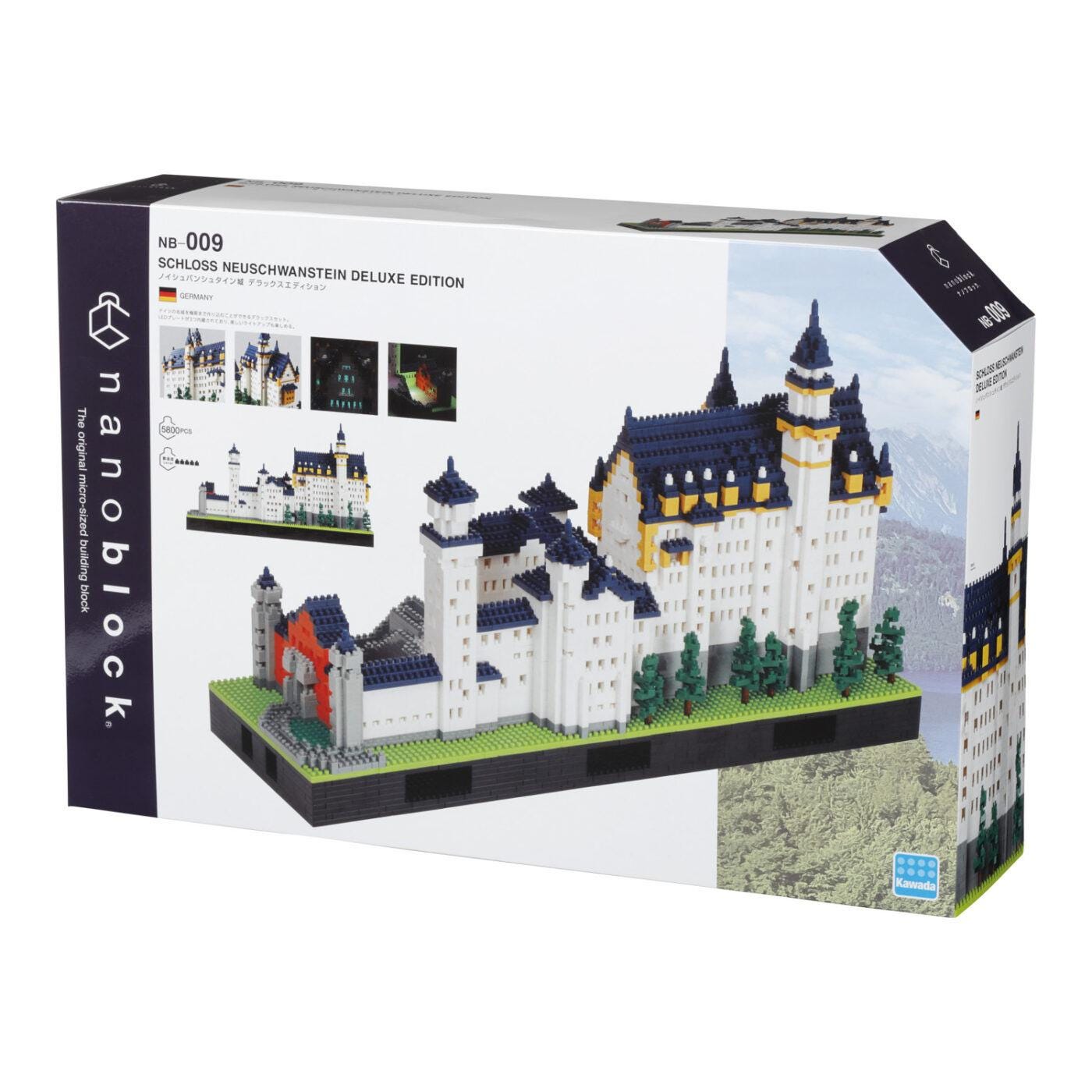 The image is a box containing a model kit of a castle, which appears to be a detailed and intricate architectural structure.