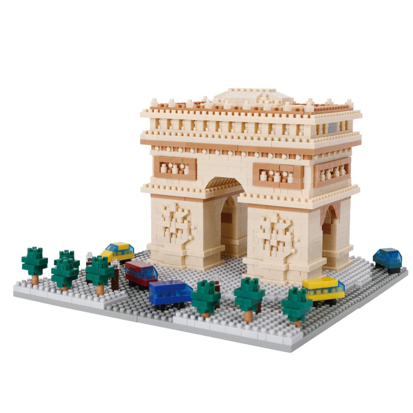 A detailed model of the Arc de Triomphe, a famous monument located in Paris, France. The model is constructed from small, colorful building blocks and features various vehicles and trees surrounding it.