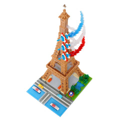 A 3D model of the Eiffel Tower made of small building blocks, with a French flag design on top.