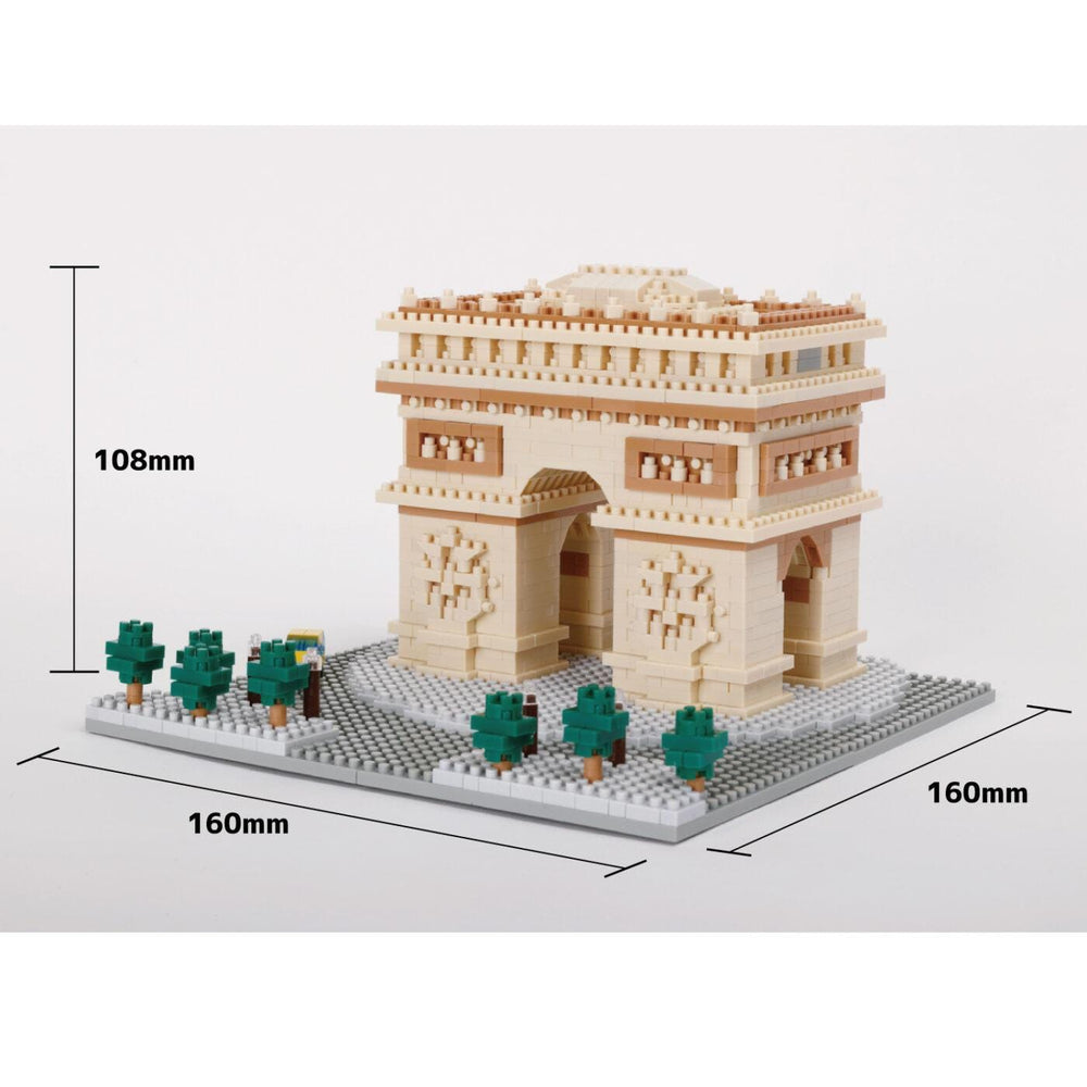 A small, beige-colored building made of blocks, likely a miniature replica of a famous landmark, such as the Eiffel Tower or the Louvre Museum. The building is surrounded by green trees and appears to be a scale model, as indicated by the measurements provided.