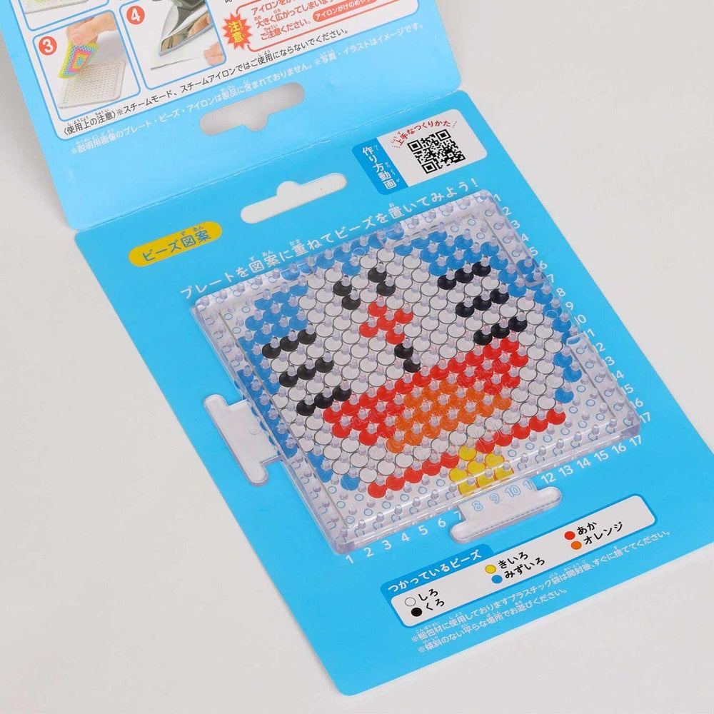 a blue and white bead mosaic kit with instructions and a QR code.