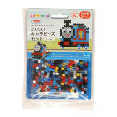 A package of Thomas & Friends train bead set, featuring a colorful train design and various colored beads.