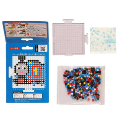 a set of items related to a craft or art project, including a blue box with instructions, a clear plastic container, and a bag filled with colorful beads.