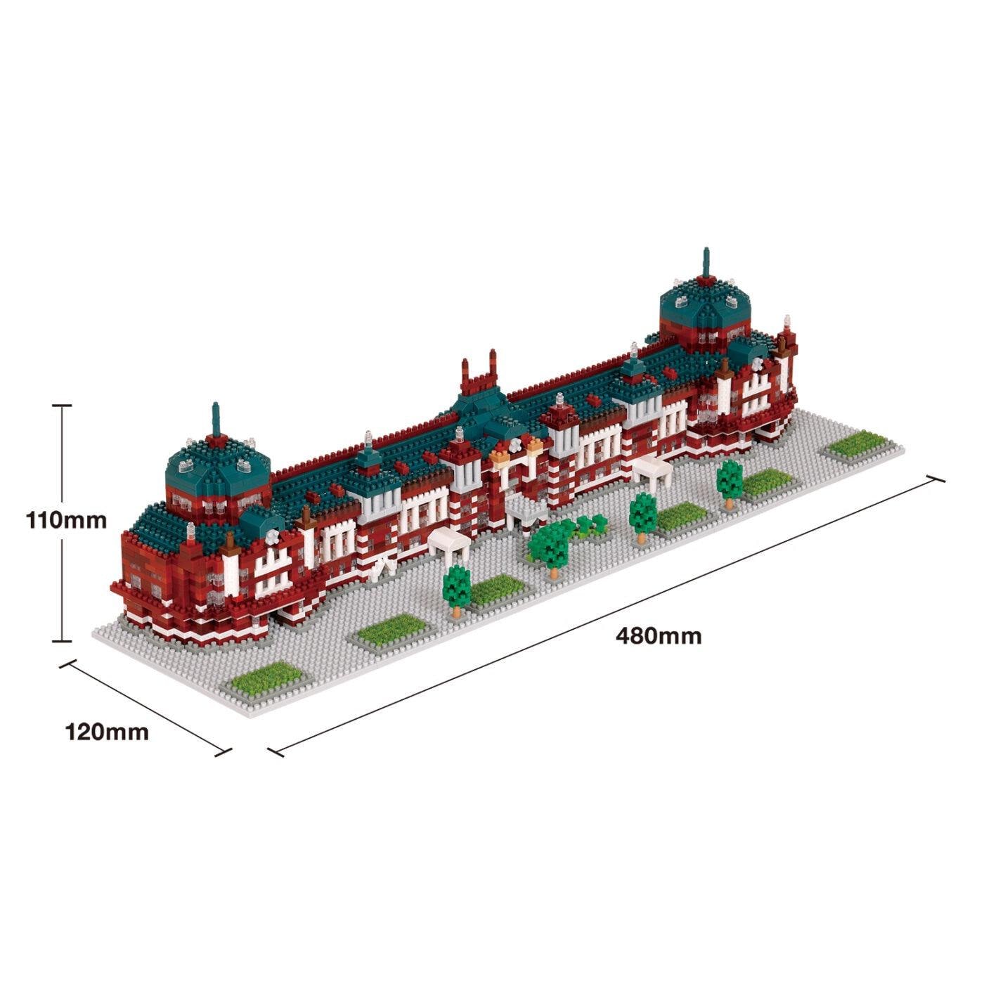 A 3D model of a building with a red and green color scheme, featuring multiple domes and towers.