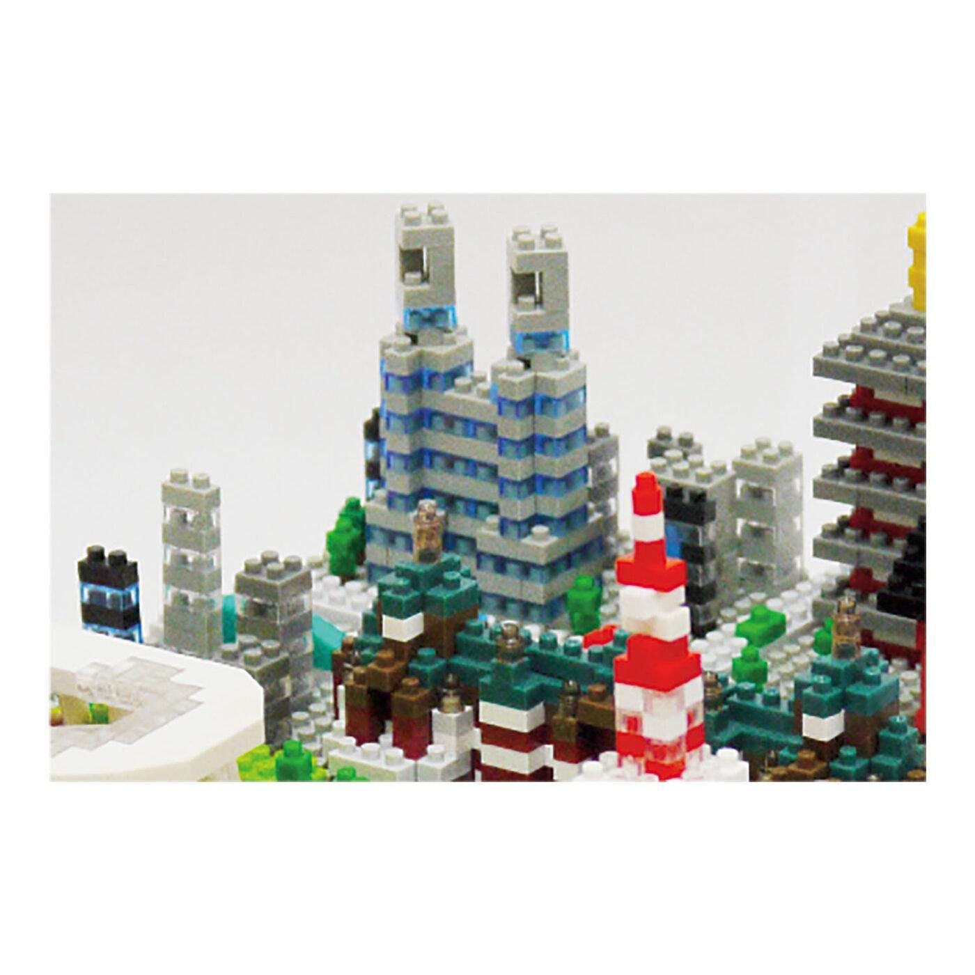 A collage of various Lego structures, including towers, buildings, and other architectural elements, arranged in a visually appealing manner.