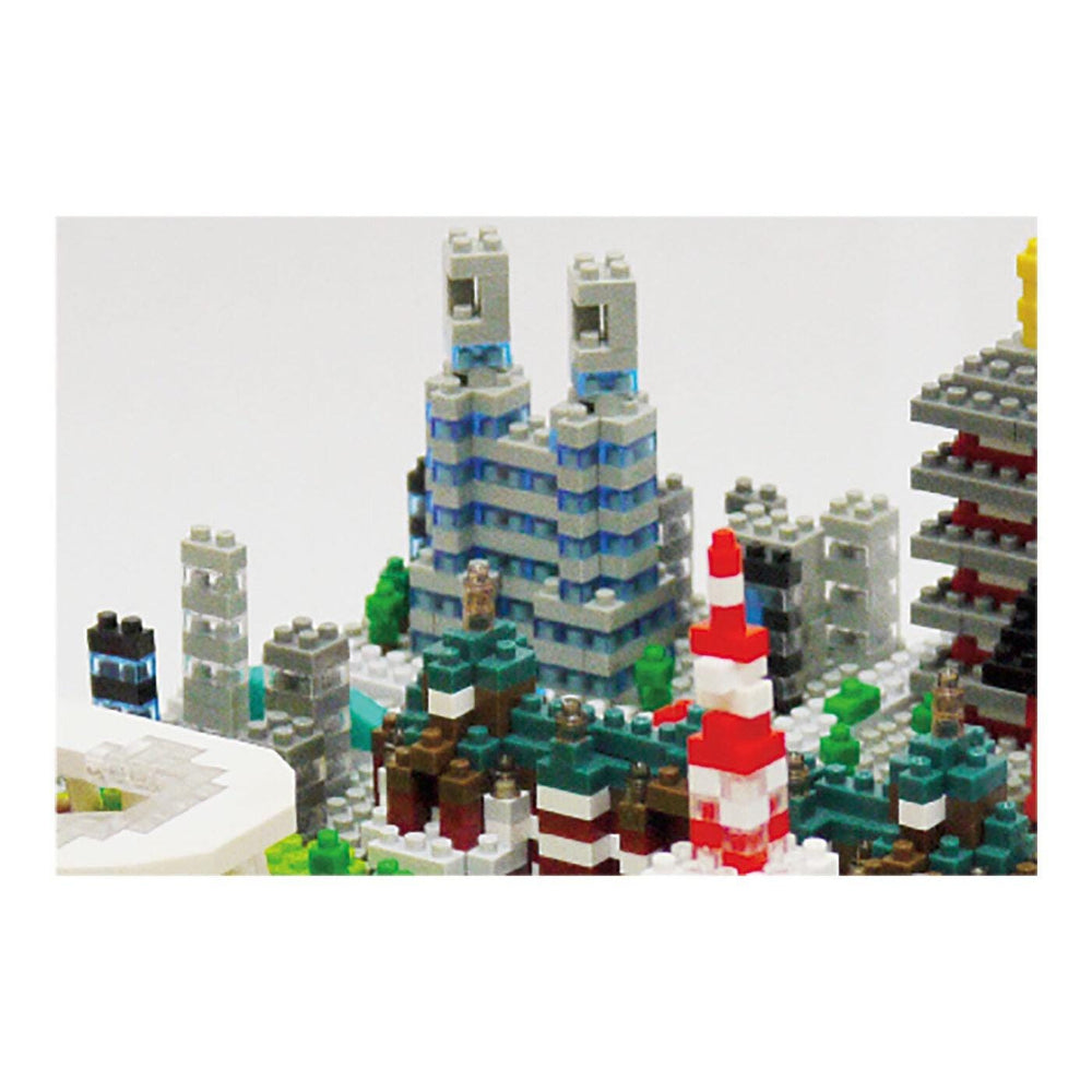 A collage of various Lego structures, including towers, buildings, and other architectural elements, arranged in a visually appealing manner.