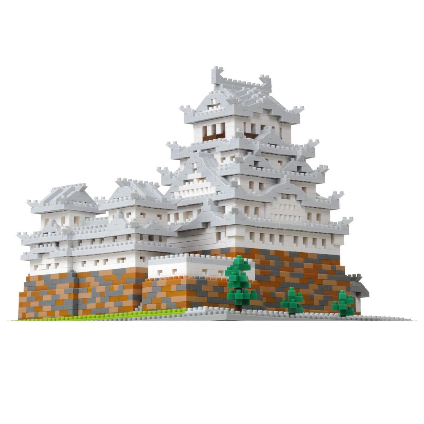 A 3D model of a castle-like structure made of small, colorful building blocks.