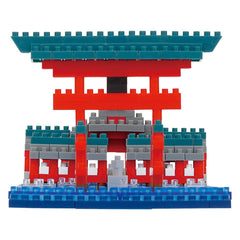 A colorful toy model of a temple or pagoda, composed of various building blocks in shades of red, blue, and gray.