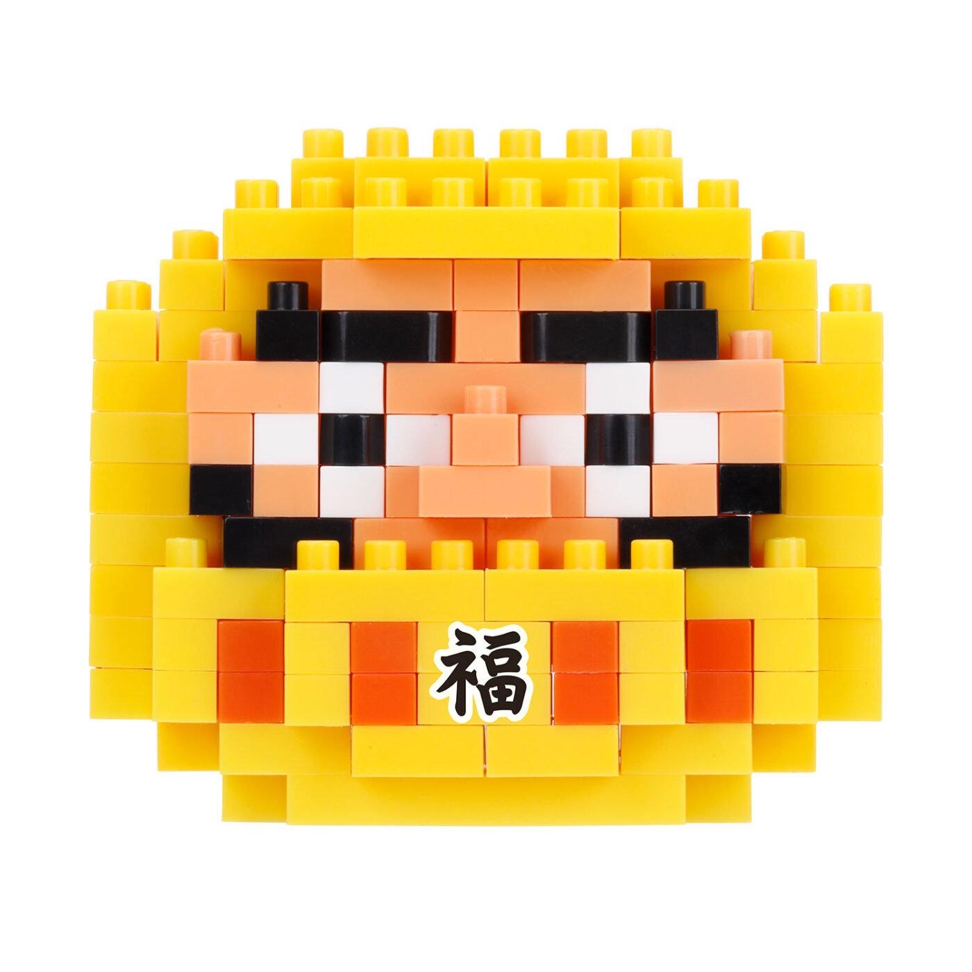 A yellow and black pixelated character composed of numerous small blocks, resembling a pixelated face or a character from a video game.