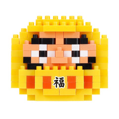 A yellow and black pixelated character composed of numerous small blocks, resembling a pixelated face or a character from a video game.