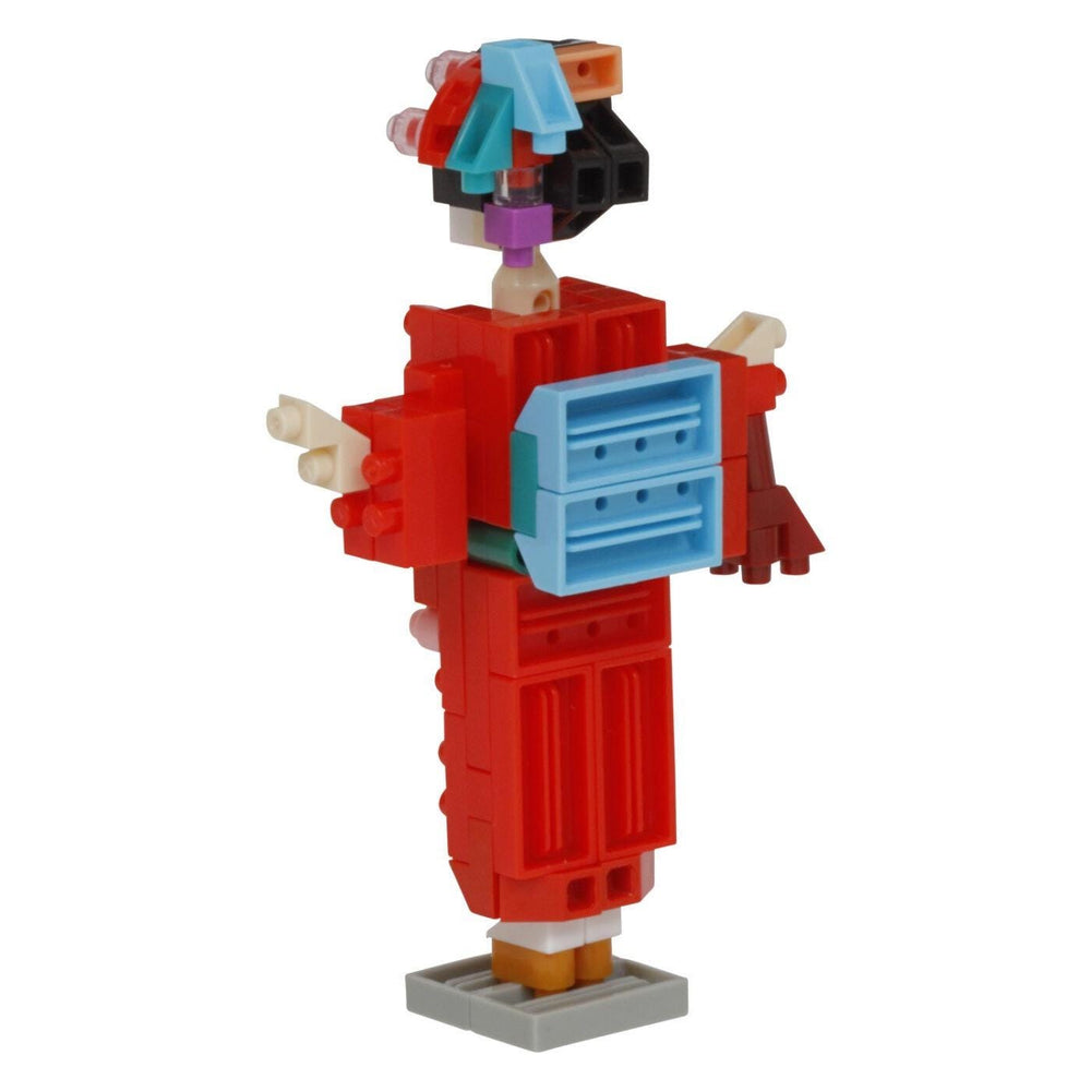 A colorful and whimsical toy figure resembling a geisha, made up of various building blocks in different colors and shapes.