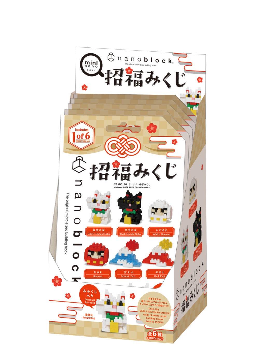 A display box containing a set of six colorful, pixelated character figurines, likely representing various characters from a popular video game franchise.