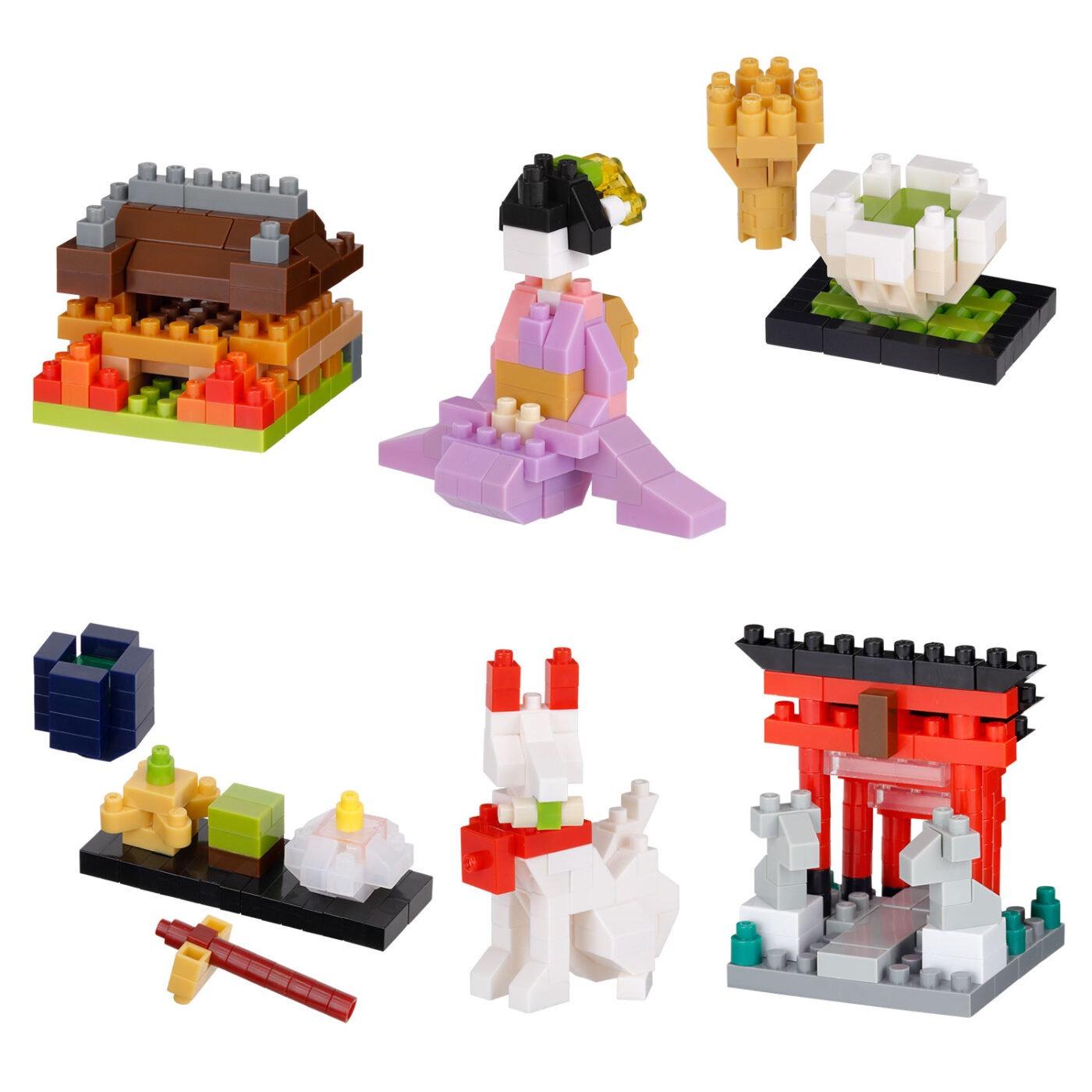 a collection of six different types of building blocks, including a house, a person, a bowl, a dog, a cat, and a gate.