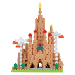 A colorful and intricate model of a castle-like structure made up of numerous small building blocks in various colors, including red, orange, yellow, and green.