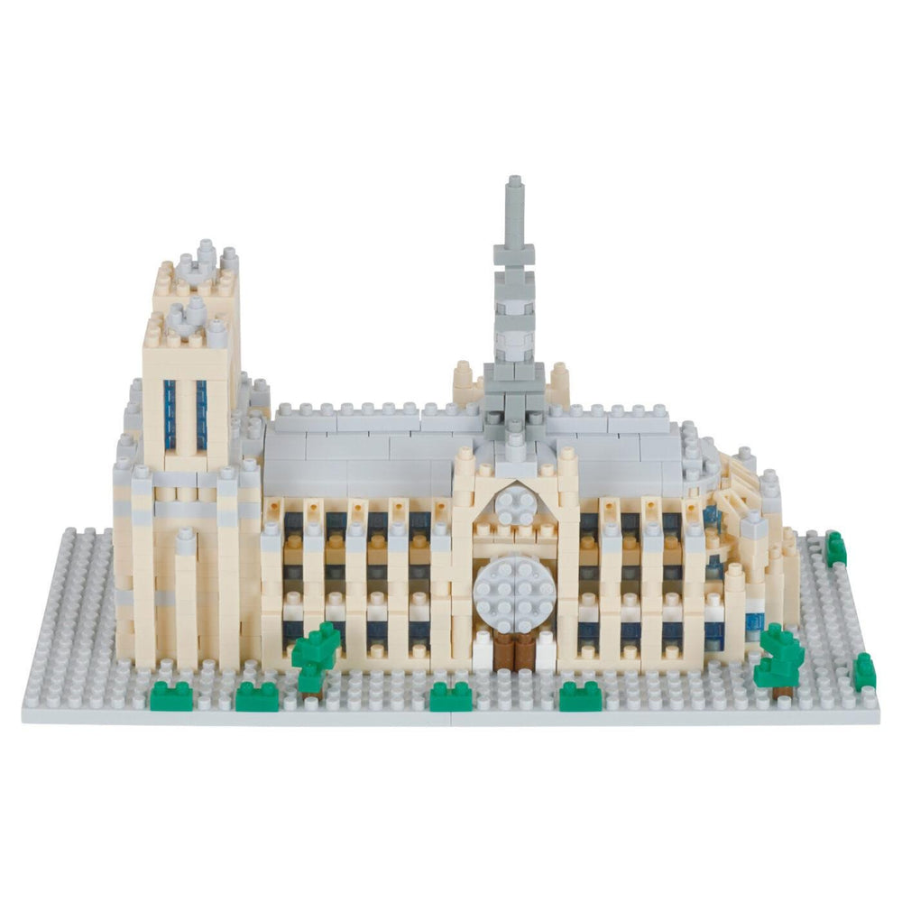 A detailed model of a building made of small Lego bricks, showcasing intricate architectural features and design elements.