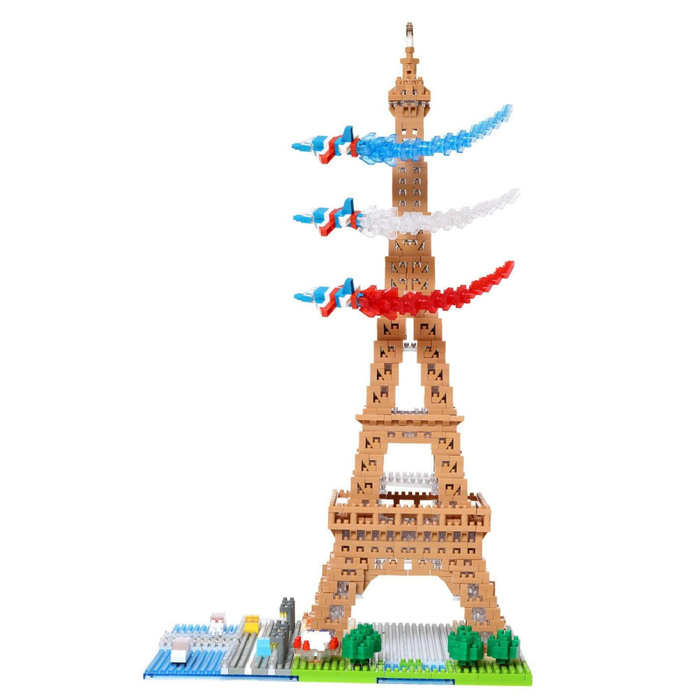 A colorful and whimsical tower made of building blocks, featuring a variety of shapes and colors, including red, white, and blue.
