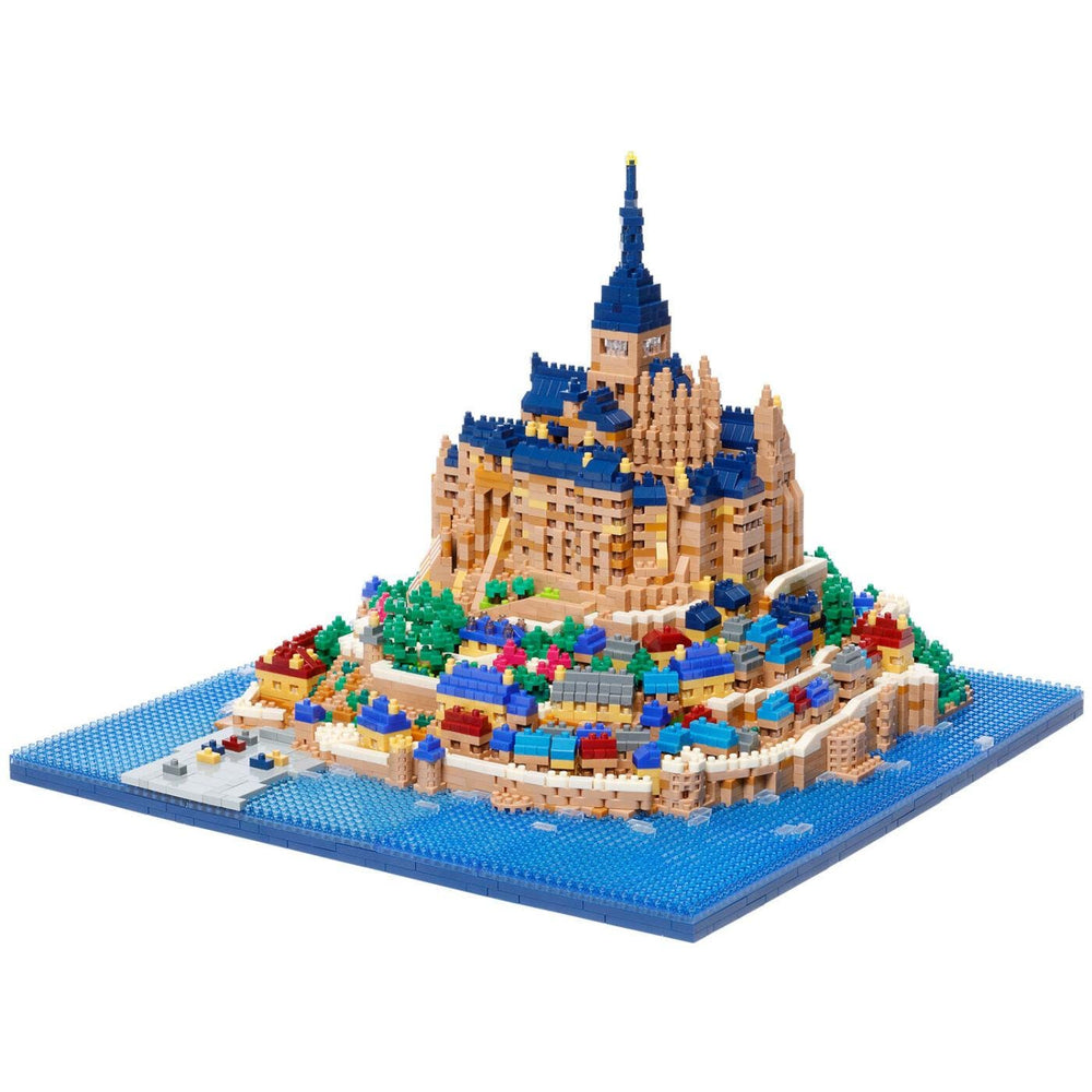 A detailed and colorful model of a castle or palace, constructed using various building blocks in different colors and shapes, set against a blue background.