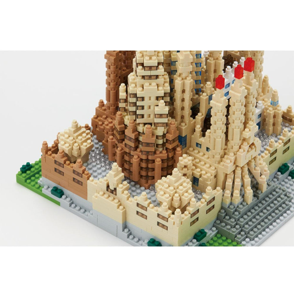 A detailed 3D model of a building, likely a landmark, constructed from small Lego bricks. The model appears to be a miniature replica of a famous architectural structure, possibly the Eiffel Tower or the Louvre Museum.