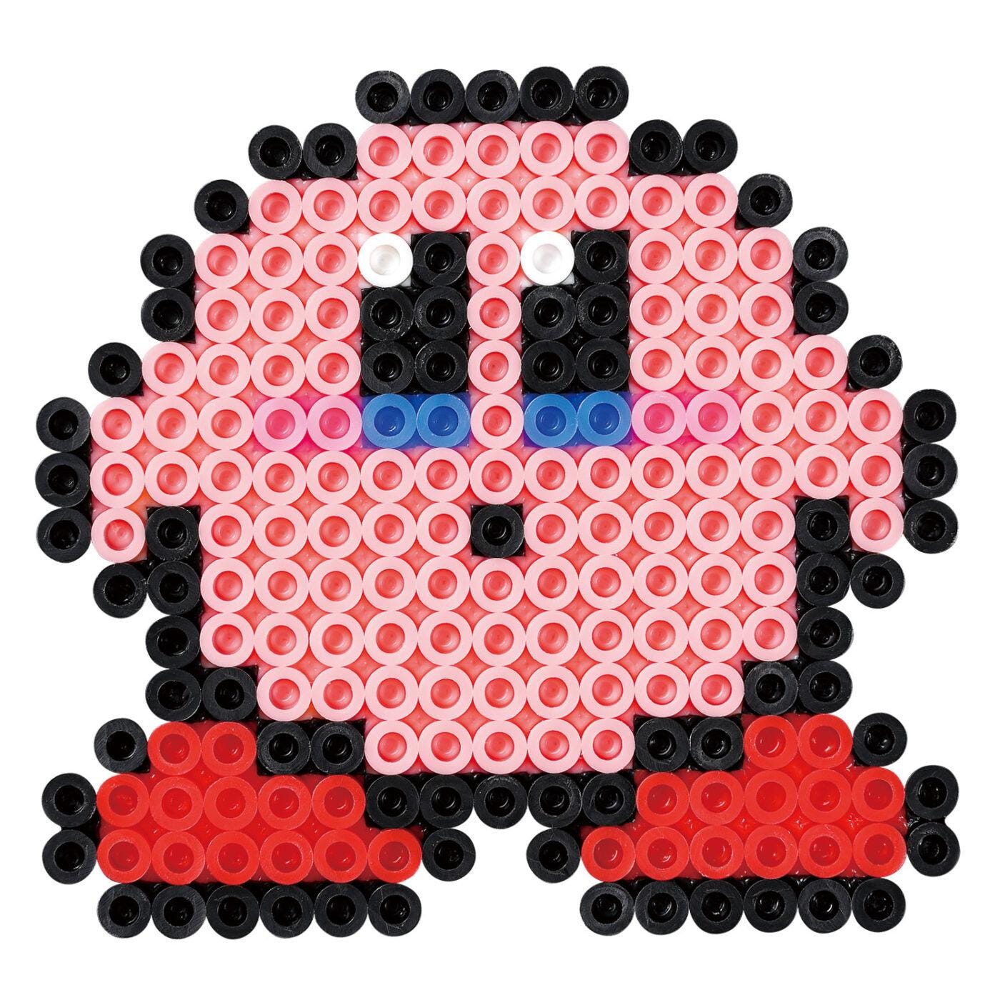 A pixelated character composed of small circular beads in various colors, including pink, black, and red.