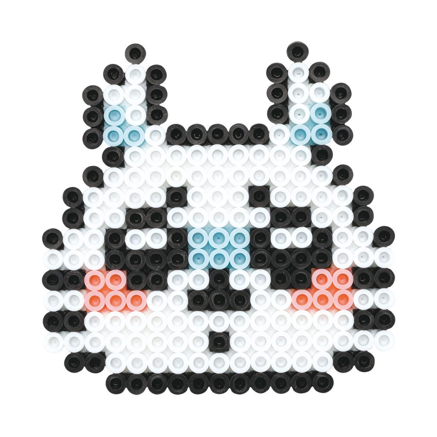 A pixelated image depicting a cute, cartoon-like rabbit or bunny character composed of small black and white beads.