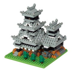 Assembled Kumamoto Castle nano building blocks model on green baseplate