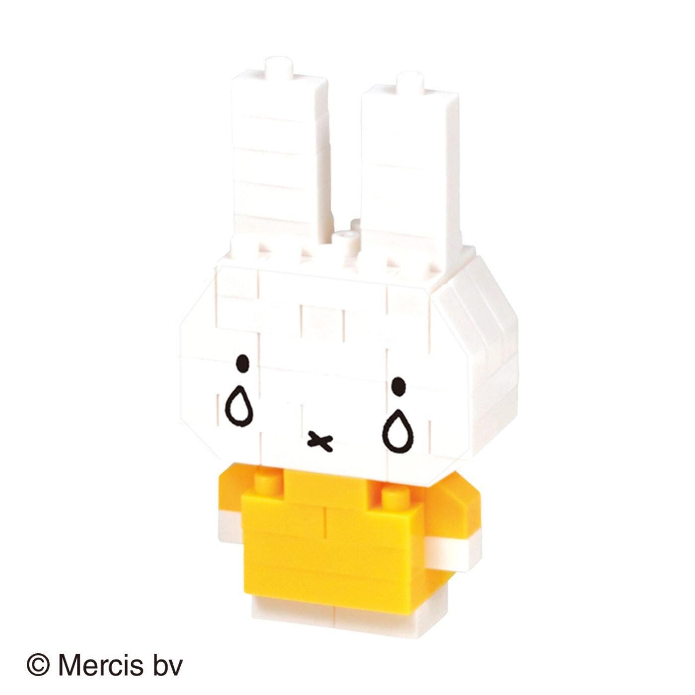 White rabbit nano building block figure with yellow lower body and black face details
