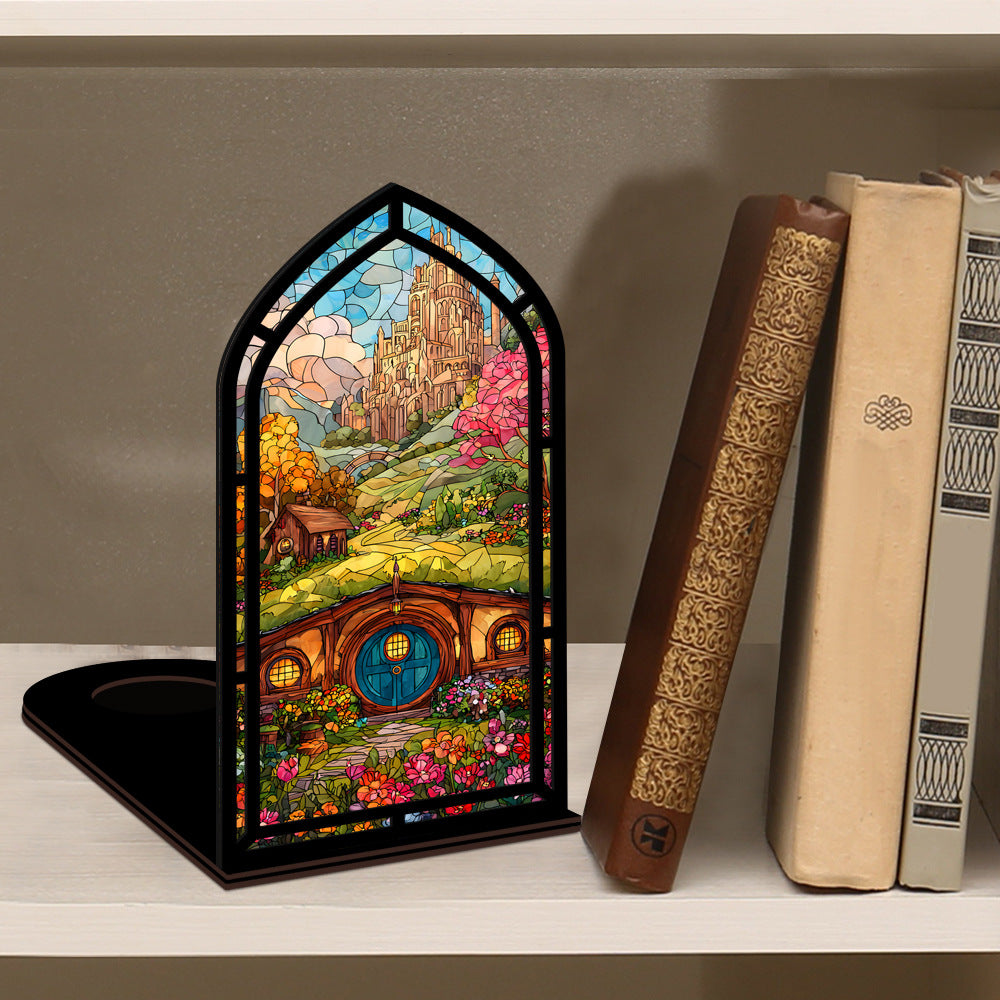 Arched book nook display with colorful interior artwork, standing on a black rectangular base.